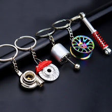 Laden Sie das Bild in den Galerie-Viewer, Creative gift car metal keychain turbo gear hub pendant brake disc shock absorber Pendant - KTStechnixx