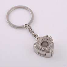 Laden Sie das Bild in den Galerie-Viewer, Creative gift car metal keychain turbo gear hub pendant brake disc shock absorber Pendant - KTStechnixx